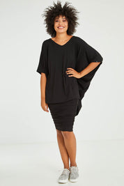 Model Olivia wearing size OneSize of the Hi Low Top in colour Black (Black), from the front, showing the whole outfit