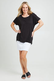 Model Grace wearing the Destiny Top in colour Black (Black), from the front, showing the whole outfit