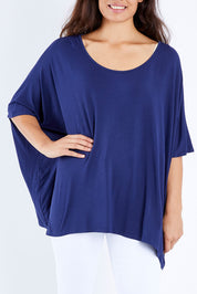 Model Larissa wearing size OneSize of the Nice Top in colour Navy (Blue), from the front, cropped image