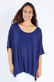 Model Larissa wearing size OneSize of the Nice Top in colour Navy (Blue), from the front, cropped image