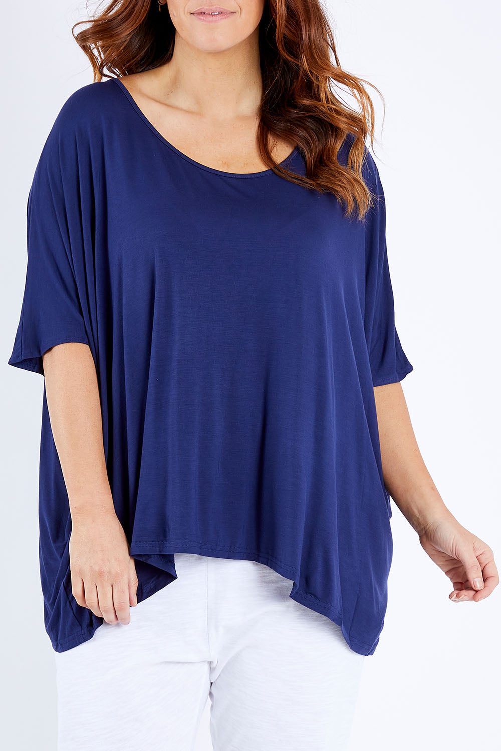 Model Laura wearing size OneSize of the Nice Top in colour Navy (Blue), from the front, cropped image