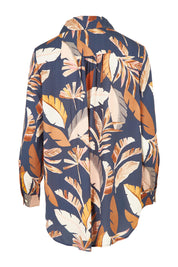Product shot of the Aspen Shirt in colour Darkpalme, from the back