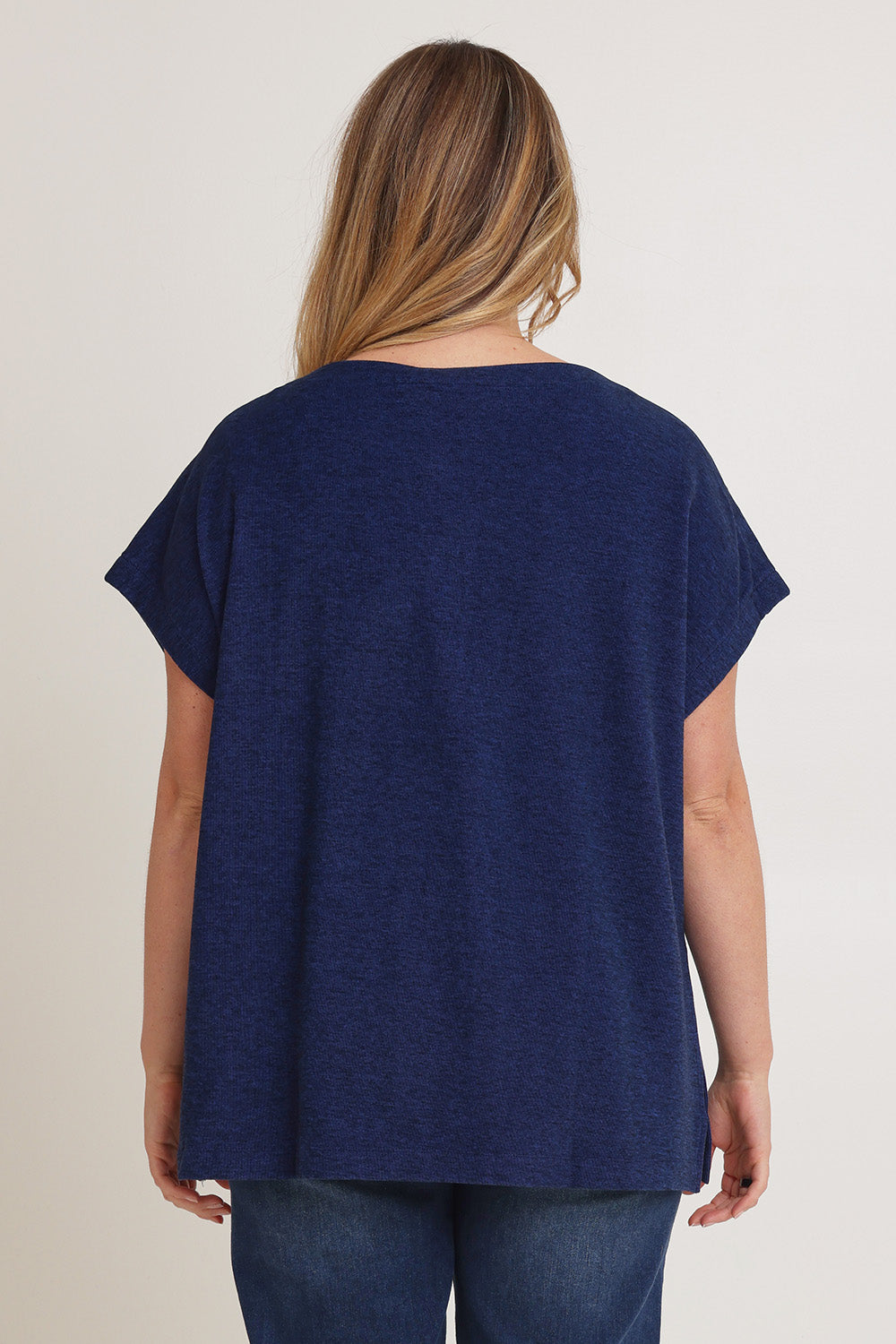 Model Chanel wearing size XL of the Bridget Top in colour Ocean (Blue), from the back
