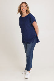 Model Chanel wearing size XL of the Bridget Top in colour Ocean (Blue), from the front, showing the whole outfit