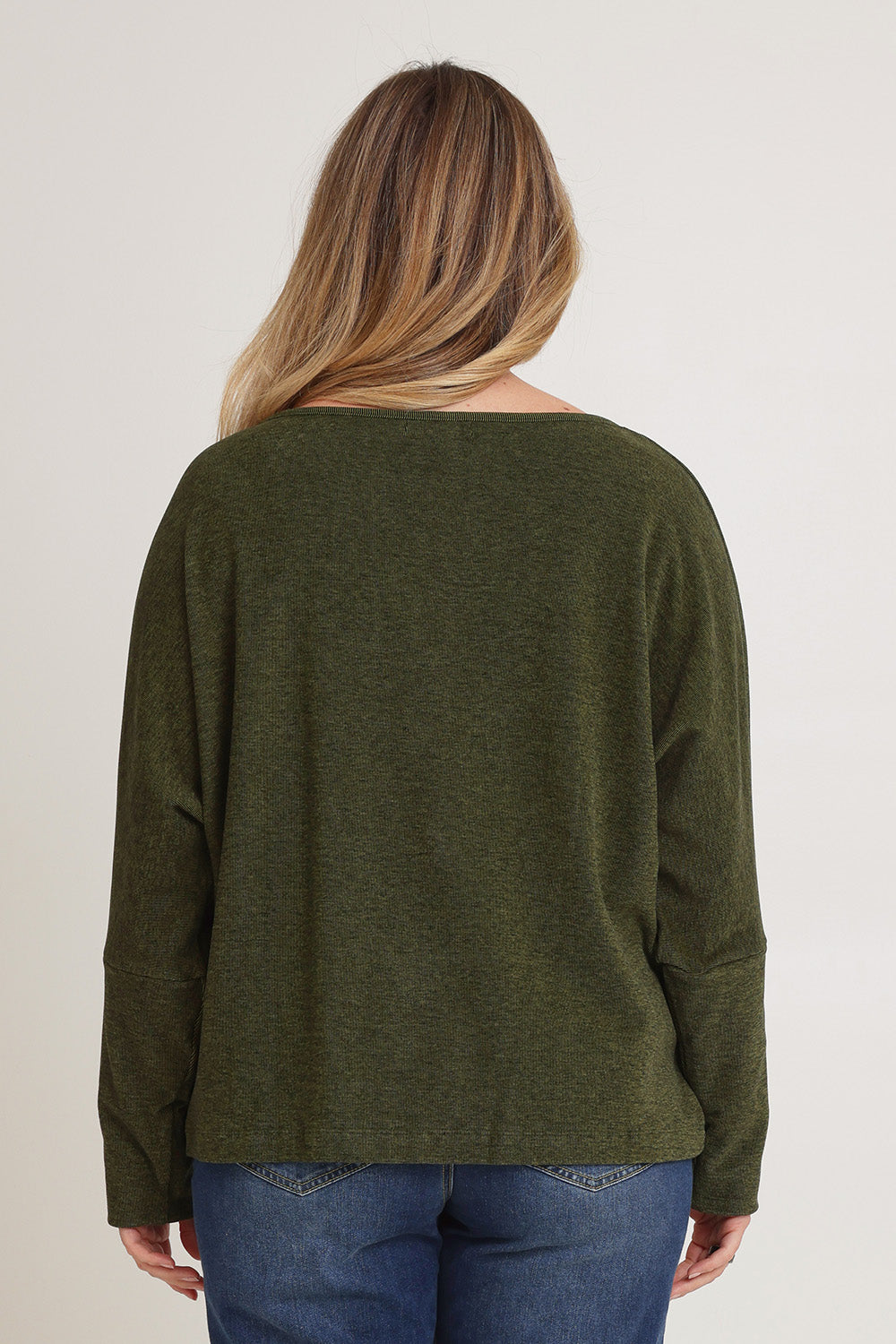 Model Chanel wearing size XL of the Pennie Long Sleeve Top in colour Fern (Green), from the back