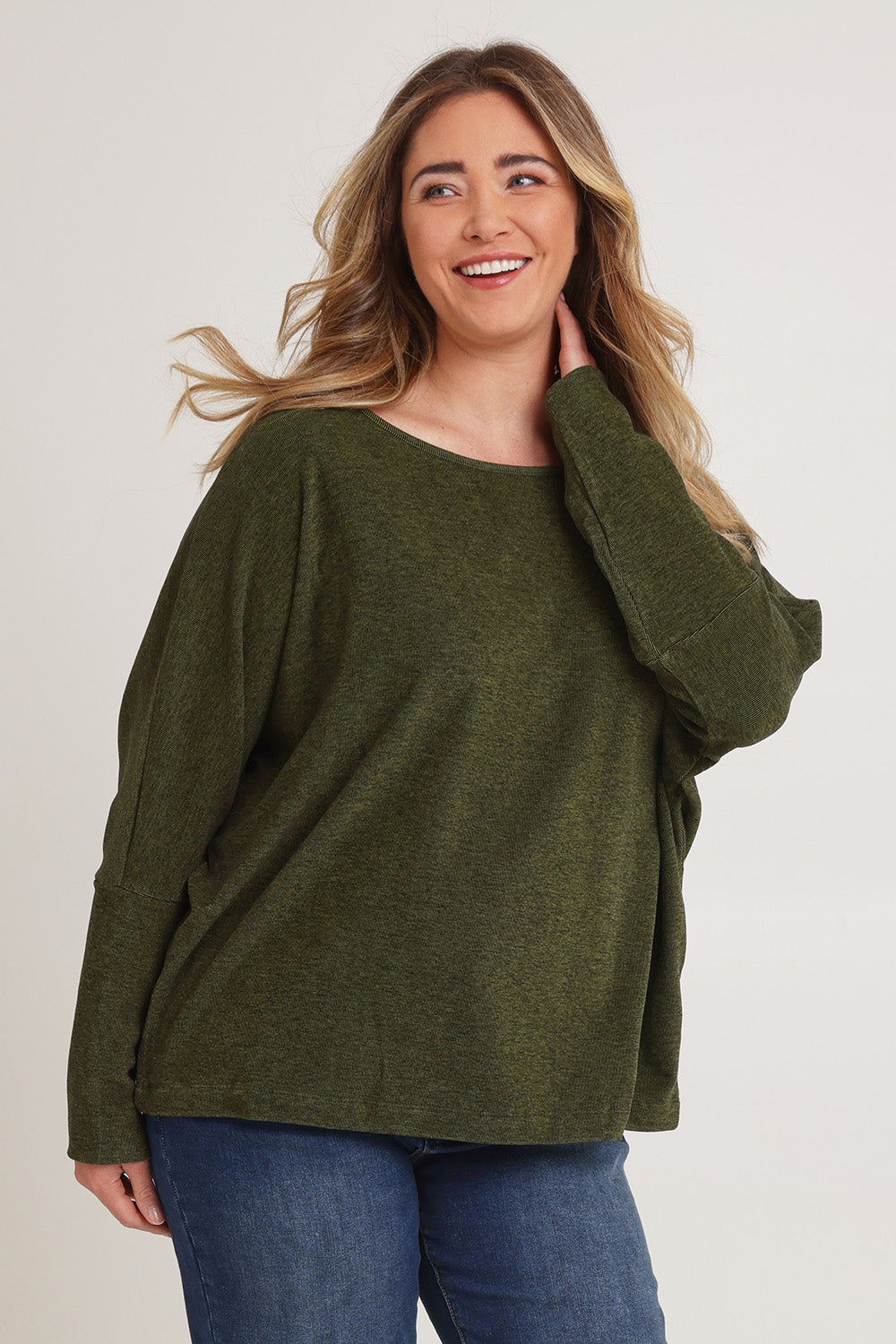 Model Chanel wearing size XL of the Pennie Long Sleeve Top in colour Fern (Green), from the front, cropped image