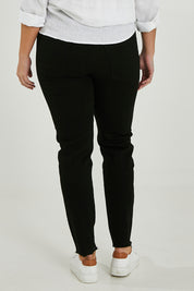 Model Maddy wearing size XXL of the Frayed Slim Fit Jean in colour Black (Black), from the back