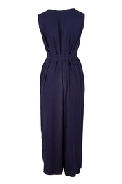 Product shot of the Button Down Jumpsuit in colour Navy (Blue), from the back