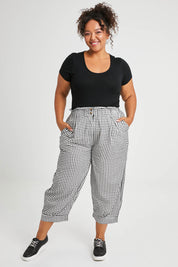 Model Alexis wearing size XL of the Archer Pant in colour Nightcheck (Blue), from the front, showing the whole outfit