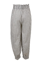 Product shot of the Archer Pant in colour Nightcheck (Blue), from the back