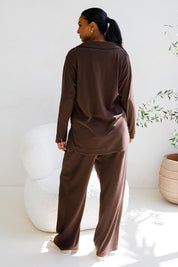 A model wearing the Gigi Lounge Pant in colour Chocolate, from the back