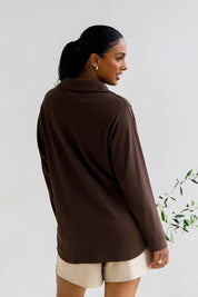 A model wearing the Gigi Lounge Sweater in colour Chocolate, from the back
