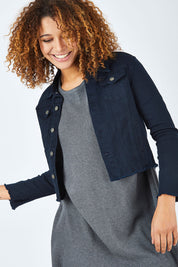Model Summer wearing size S of the Denim Jacket in colour DarkBlue (Blue), from the front, cropped image