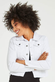 Model Olivia wearing size S of the Denim Jacket in colour White (White), from the front, cropped image