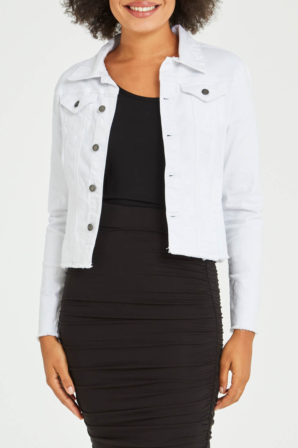 Model Olivia wearing size S of the Denim Jacket in colour White (White), from the front, cropped image