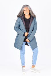 Model Nadine wearing size 10 of the Reversible Down Jacket in colour CharBlack (Grey), from the front, showing the whole outfit