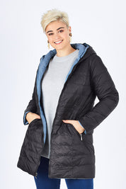 Model Stefania wearing size 14 of the Reversible Down Jacket in colour CharBlack (Grey), from the front, cropped image