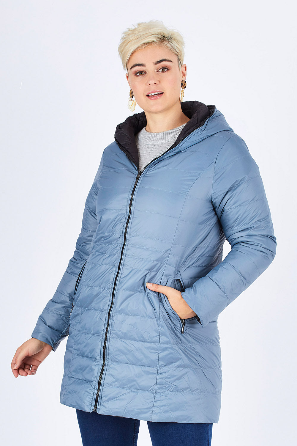 Model Stefania wearing size 14 of the Reversible Down Jacket in colour CharBlack (Grey), from the front, cropped image