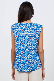 A model wearing the Helen Tank in colour Aster (Blue), from the back
