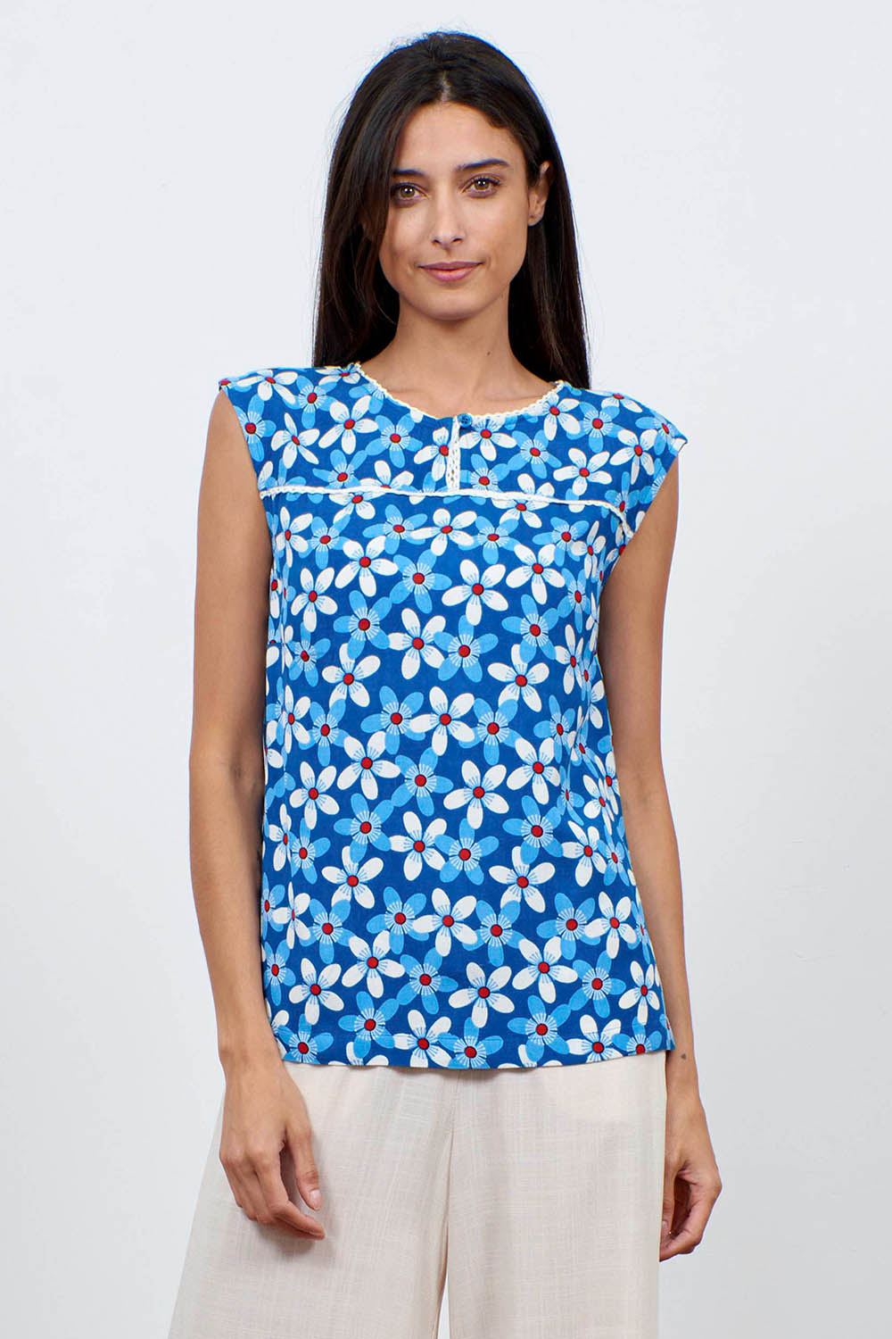 A model wearing the Helen Tank in colour Aster (Blue), from the front, cropped image