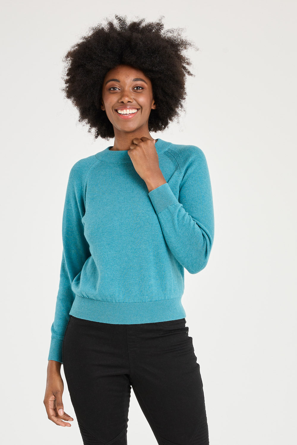 Model Aiyana wearing size 10 of the Susan Zip Back in colour Blue (Blue), from the front, cropped image