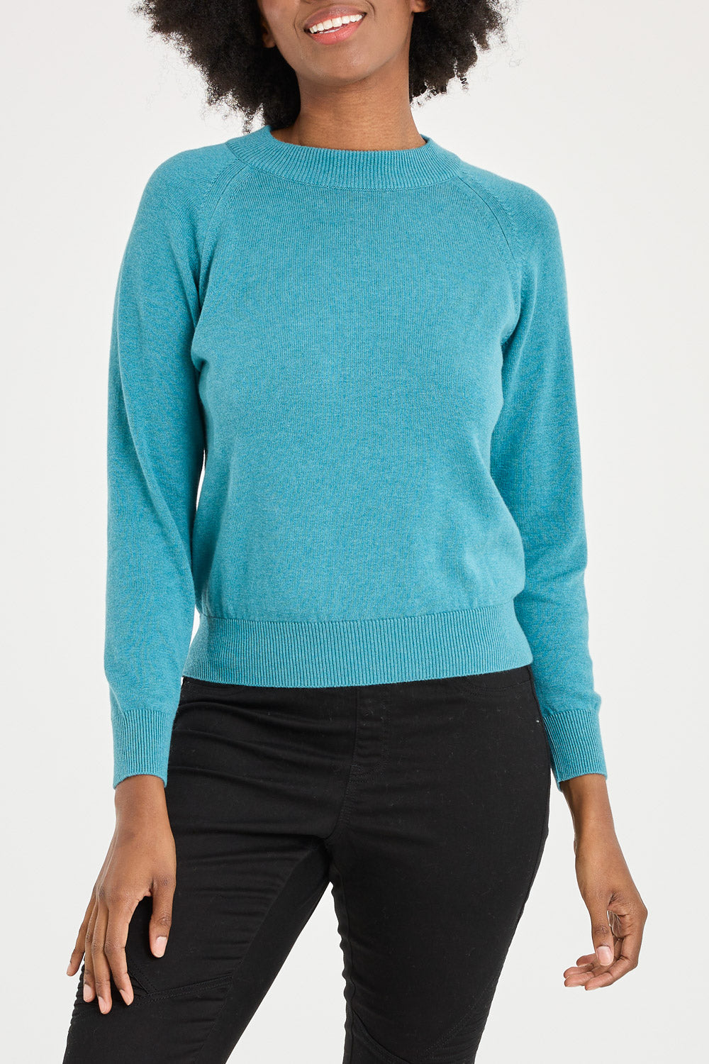 Model Aiyana wearing size 10 of the Susan Zip Back in colour Blue (Blue), from the front, cropped image