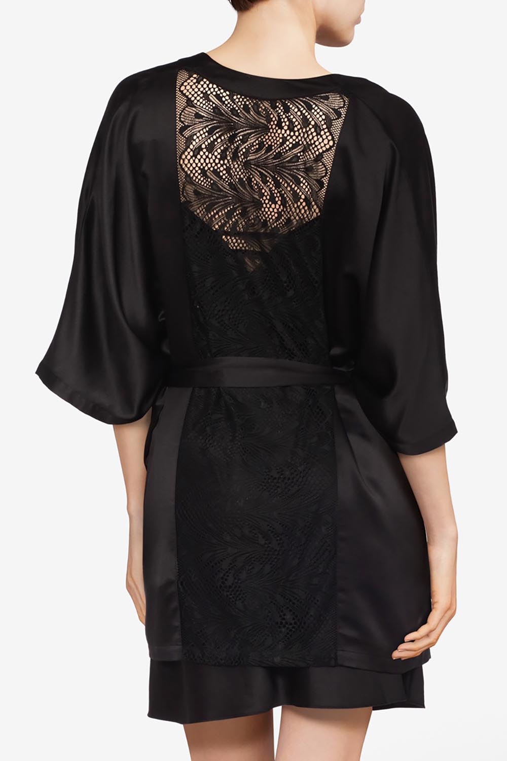 A model wearing Thelma Kimono in colour Black (Black), from the back