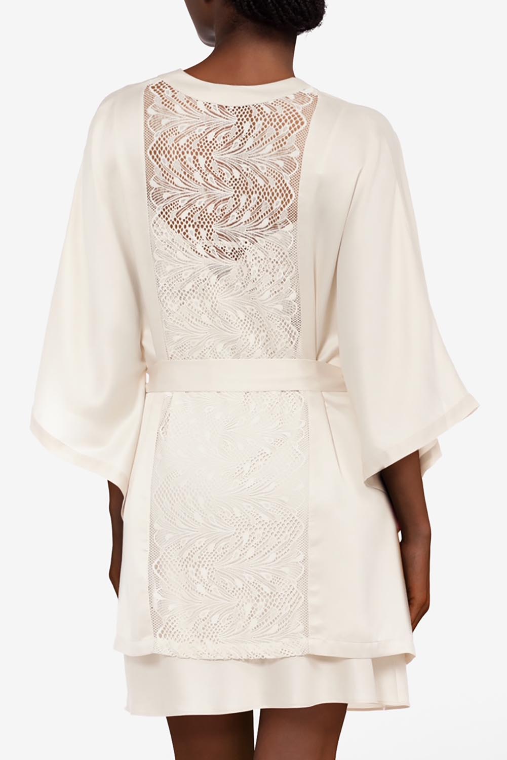 A model wearing Thelma Kimono in colour Talc, from the back