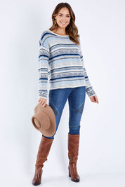 Model Madeline wearing size S of the Renee Sweater in colour Multistrip (Grey), from the front, showing the whole outfit
