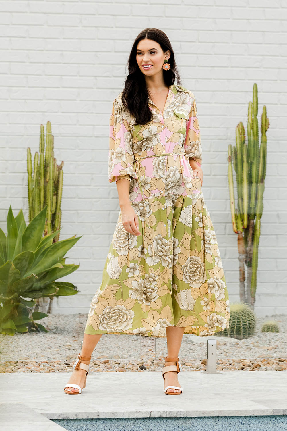 Model Stacey wearing size 10 of the Apostle Dress in colour Botanical (Pink), from the front, showing the whole outfit