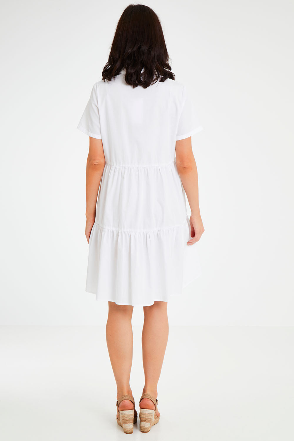 Model Andrea wearing size 10 of the Lori Dress in colour White (White), from the back