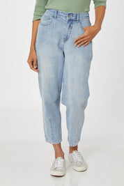 Model Cara wearing size 10 of the Isla Jean in colour Stoneblue (Blue), from the front, cropped image