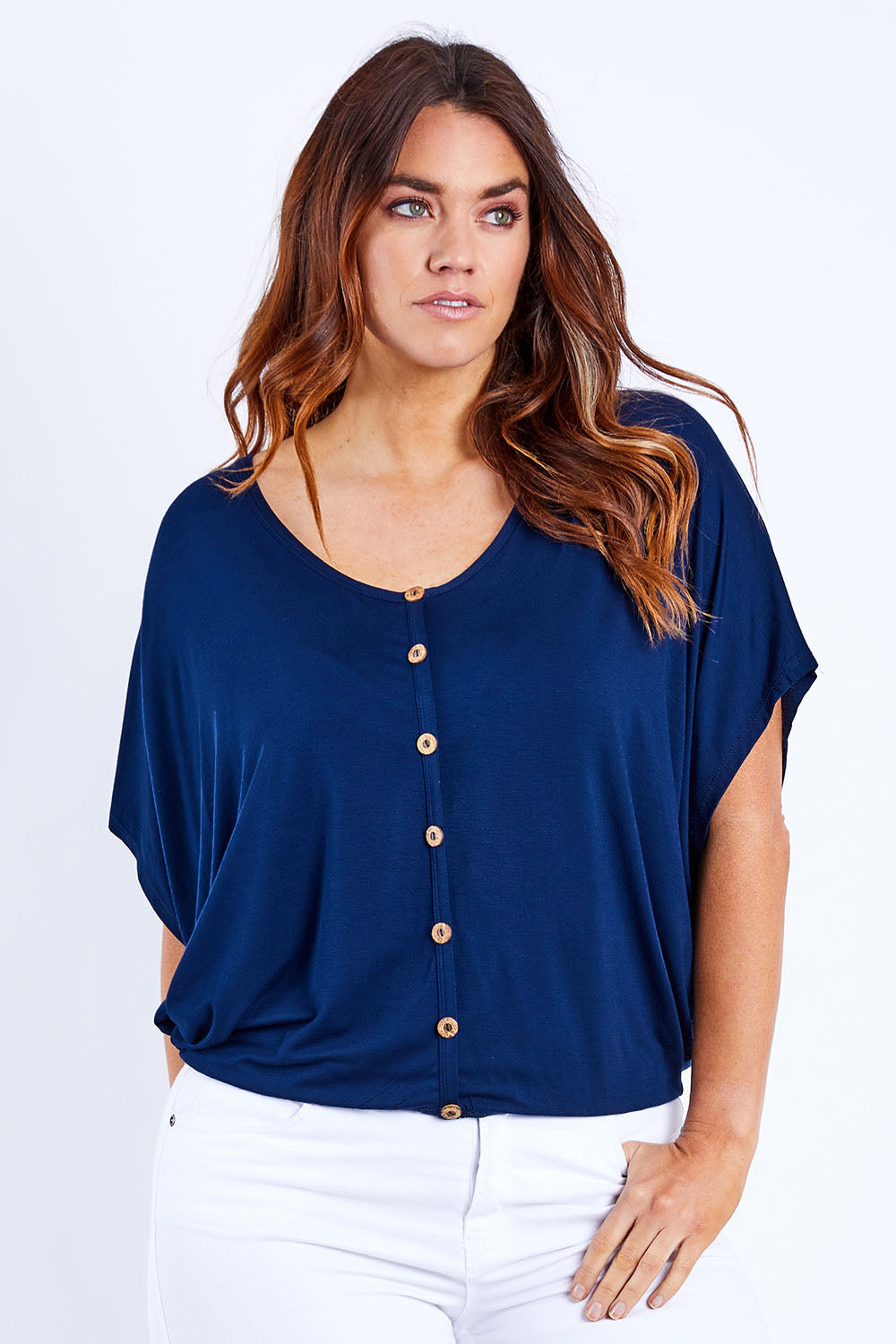 Model Laura wearing size 14 of The Relaxed Button Bamboo Tee in colour Navy (Blue), from the front, cropped image