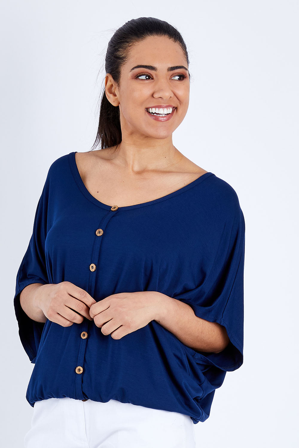 Model Pamela wearing size 10 of The Relaxed Button Bamboo Tee in colour Navy (Blue), from the front, cropped image