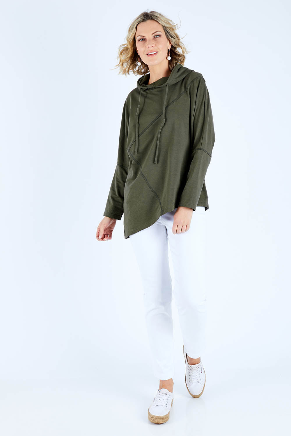 Model Chelsea wearing size 10 of The Cowl Neck Hoody in colour Khaki (Green), from the front, showing the whole outfit