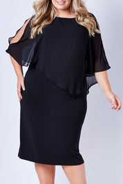 Model Sophie wearing size 20 of The Overlay Midi Dress in colour Black (Black), from the front, cropped image