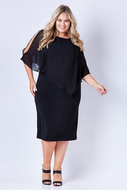 Model Sophie wearing size 20 of The Overlay Midi Dress in colour Black (Black), from the front, showing the whole outfit