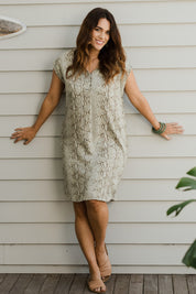 Model Laura wearing size 14 of The Button Up Snake Shift in colour Khaki (Green), from the front, showing the whole outfit