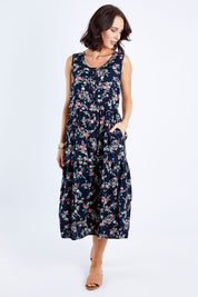Model Andrea wearing size 10 of The Print Layered Maxi in colour Navyprint (Blue), from the front, showing the whole outfit