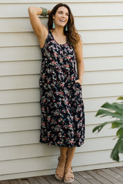 Model Laura wearing size 10 of The Print Layered Maxi in colour Navyprint (Blue), from the front, showing the whole outfit