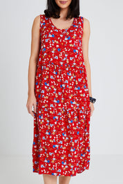 Model Andrea wearing size 10 of The Print Layered Maxi in colour Redfloral (Red), from the front, cropped image