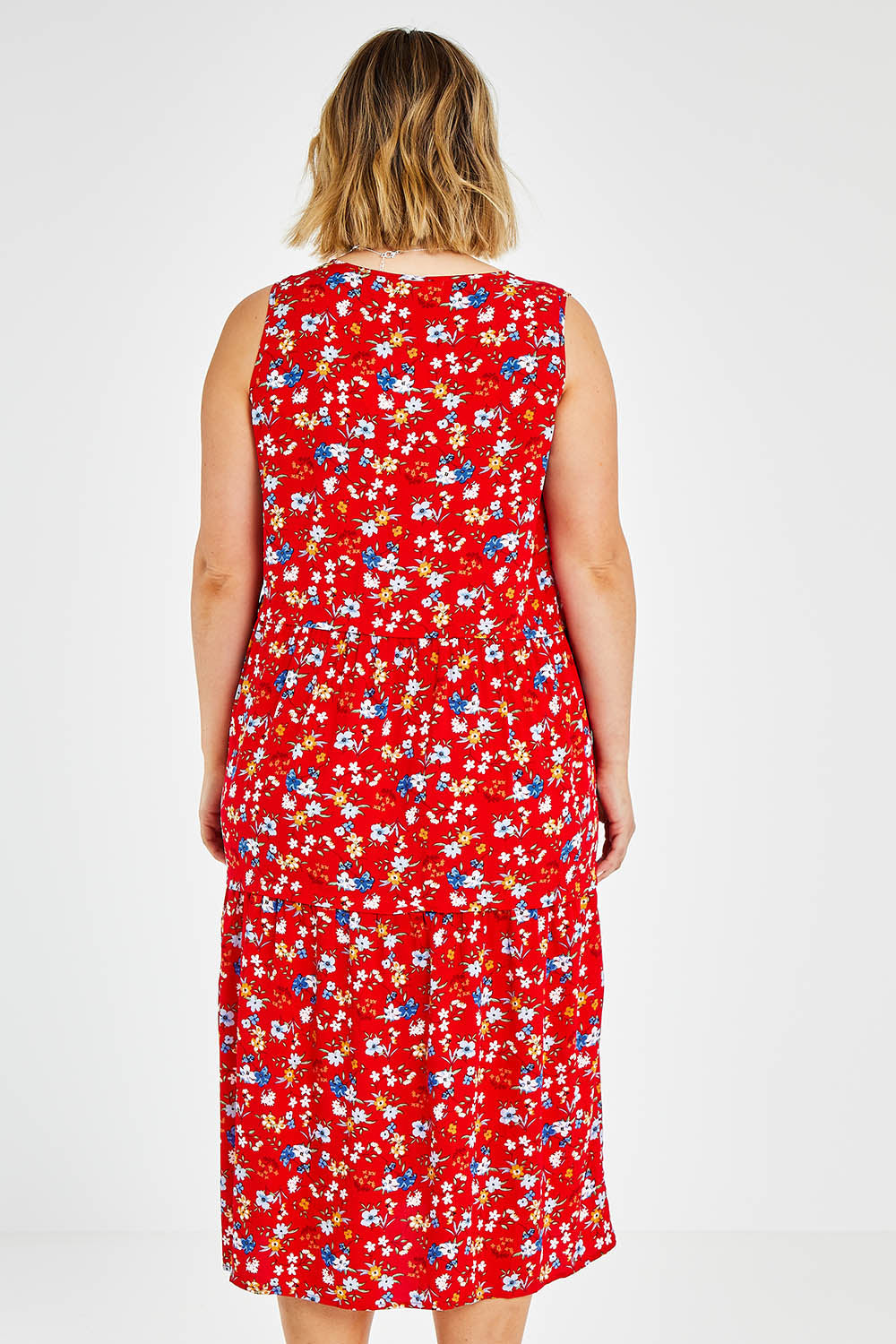 Model Jess wearing size 14 of The Print Layered Maxi in colour Redfloral (Red), from the back