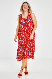 Model Jess wearing size 14 of The Print Layered Maxi in colour Redfloral (Red), from the front, showing the whole outfit