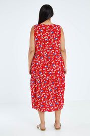 Model Sasha-Lee wearing size 16 of The Print Layered Maxi in colour Redfloral (Red), from the back