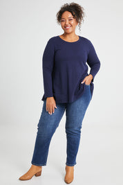 Model Alexis wearing size 16 of The Boyfriend Jean in colour Mediumblue (Blue), from the front, showing the whole outfit