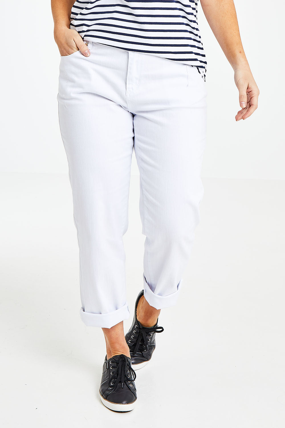 Model Laura wearing size 14 of The Boyfriend Jean in colour White (White), from the front, cropped image