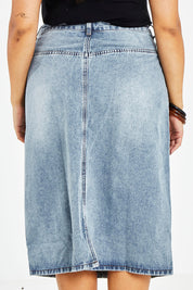 Model Sasha-Lee wearing size 14 of The Midi Denim Skirt in colour Denim (Blue), from the back