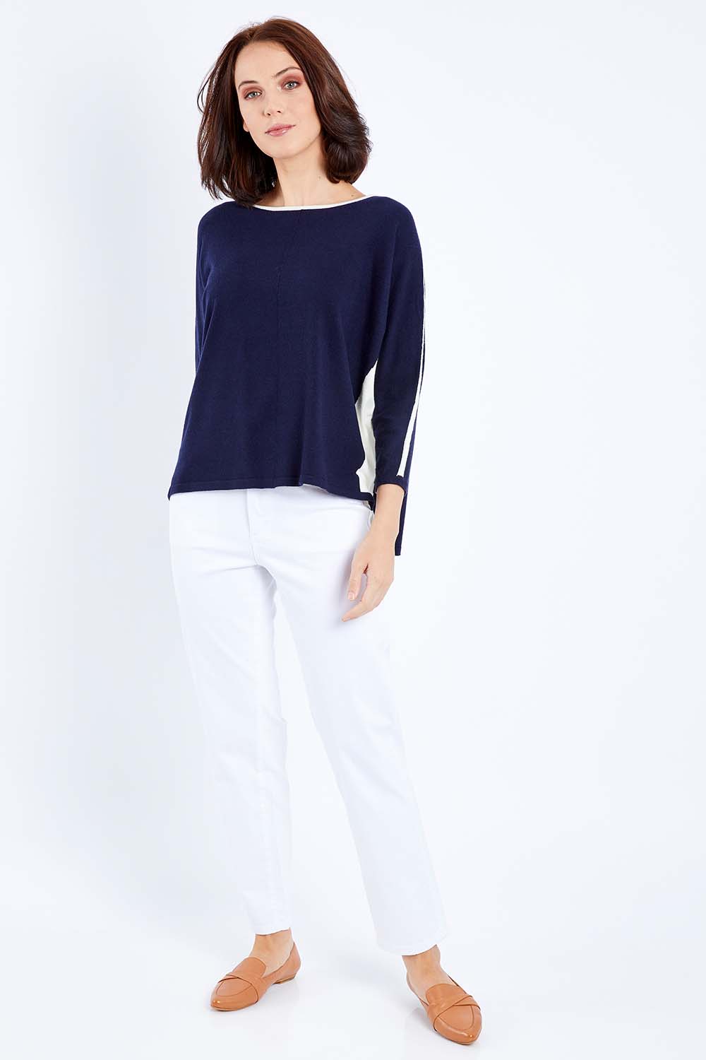 Model Andrea wearing size S of The 2 Tone Jumper in colour Navy (Blue), from the front, showing the whole outfit