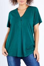 Model Lala wearing size 10 of The Stitch Detail Short Sleeve Top in colour Pinegreen (Green), from the front, cropped image