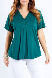 Model Laura wearing size 14 of The Stitch Detail Short Sleeve Top in colour Pinegreen (Green), from the front, cropped image